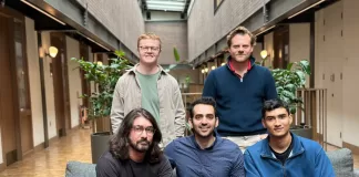Hasan Sukkar (C) with his team at 11xAI.