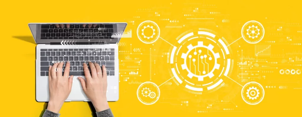 Automation concept with person using a laptop computer