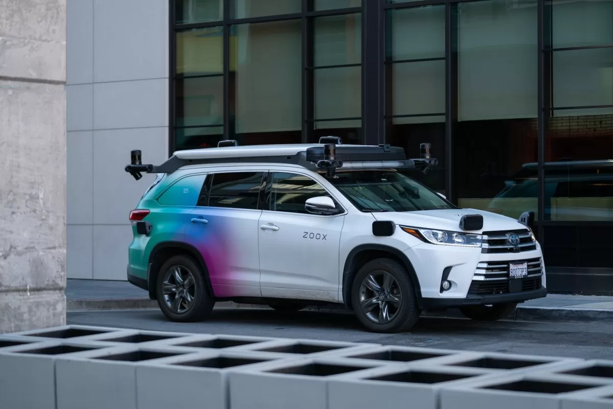 Zoox Toyota Highlander test fleet vehicle equipped with lidar, radar, camera sensors.