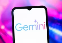 The Google Gemini AI logo is seen displayed on a smartphone screen.