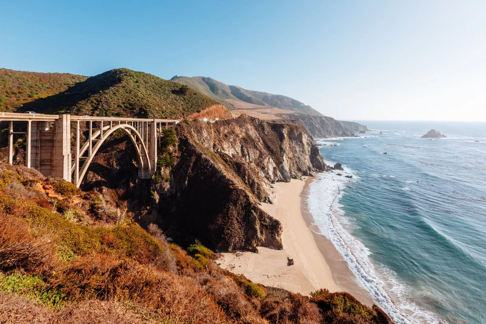 Image may contain Arch Architecture Nature Outdoors Sea Water Scenery Promontory Shoreline Coast and Landscape