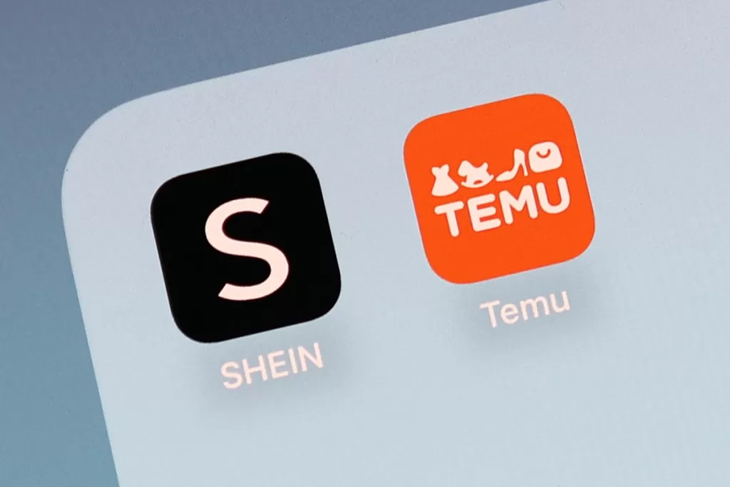 Shein and Temu icons are seen displayed on a phone screen in this illustration photo