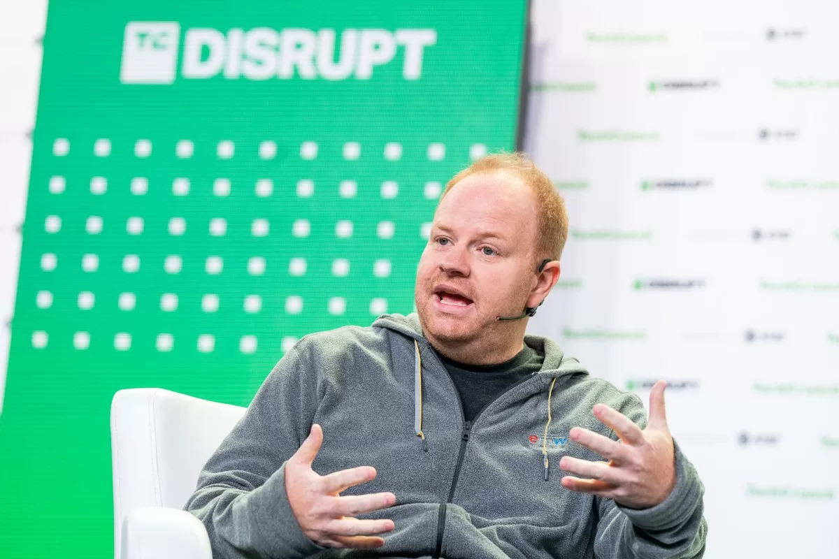Parker Conrad, CEO at Rippling talks with Mary Ann Azevedo talk about "Going Global" at TechCrunch Disrupt in San Francisco on October 20, 2022. Image Credit: Haje Kamps / TechCrunch