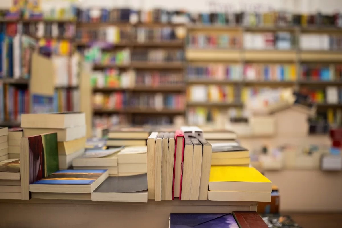 Interior of a modern bookstore with variety of books stacked all around.