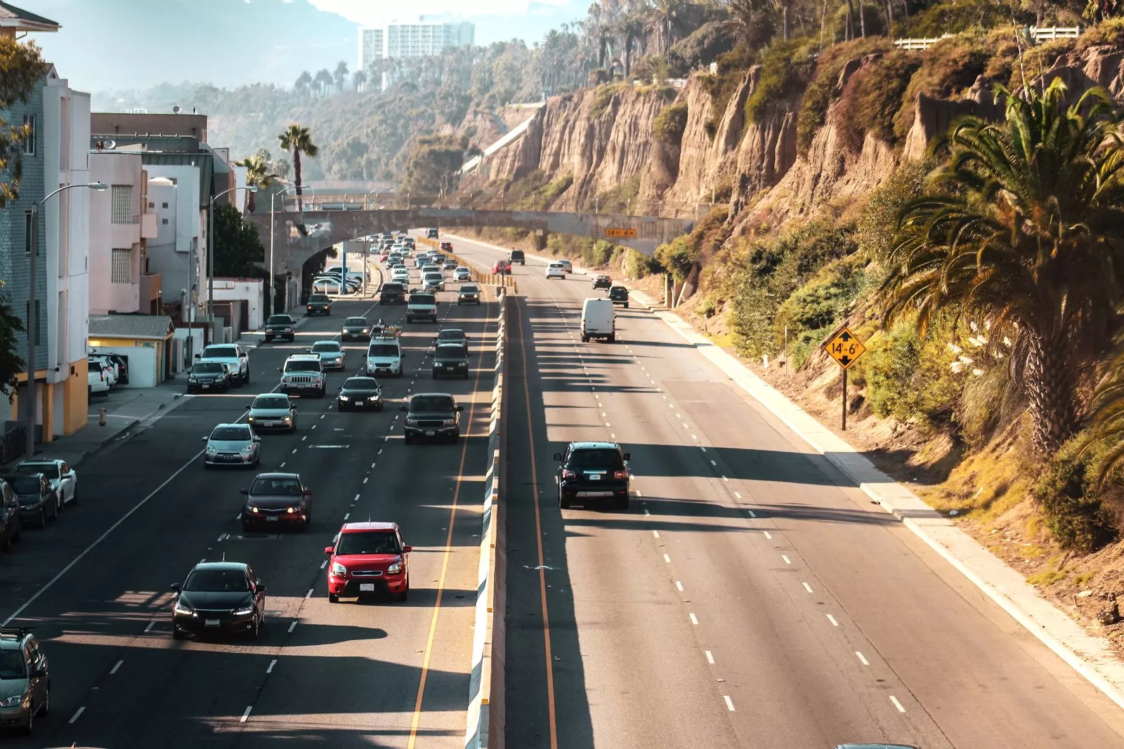 Image may contain Road Car Transportation Vehicle Freeway Outdoors Architecture Building Cityscape and Urban