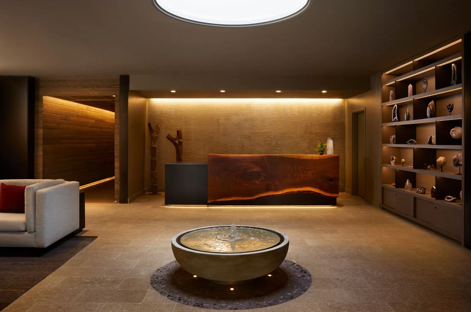 Image may contain Indoors Interior Design Architecture Building Furniture Living Room Room Couch Tub and Lighting