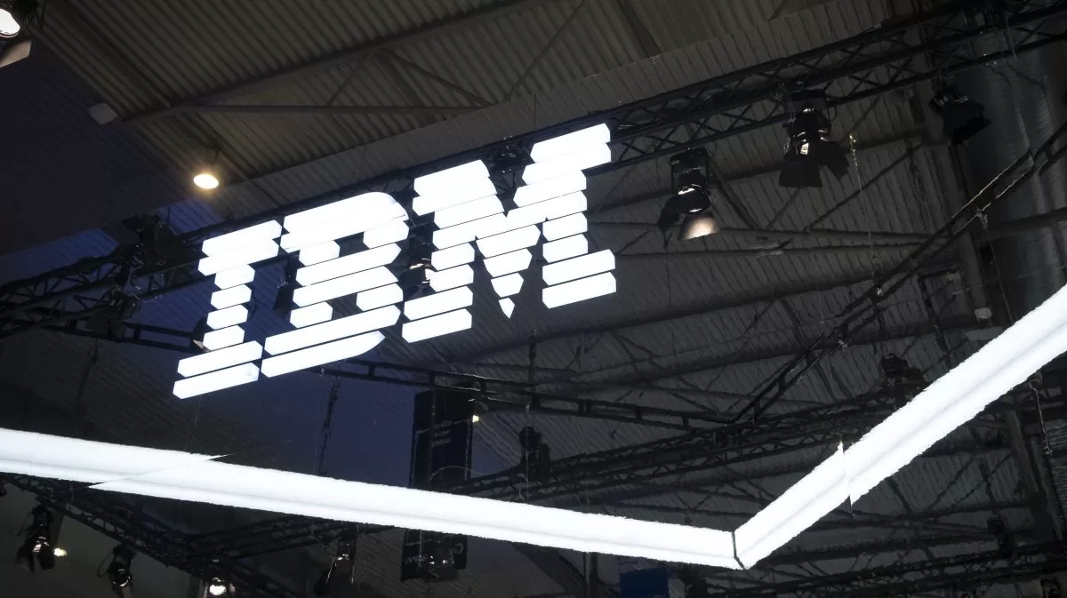 an IBM logo lit up on a dark background