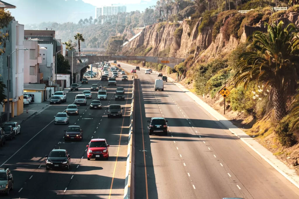 Image may contain Road Car Transportation Vehicle Freeway Outdoors Architecture Building Cityscape and Urban