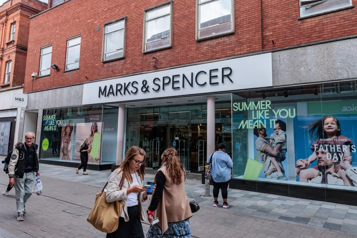 Members of the public walk past a branch of Marks & Spencer on 11th June 2025 in Maidenhead, United Kingdom.