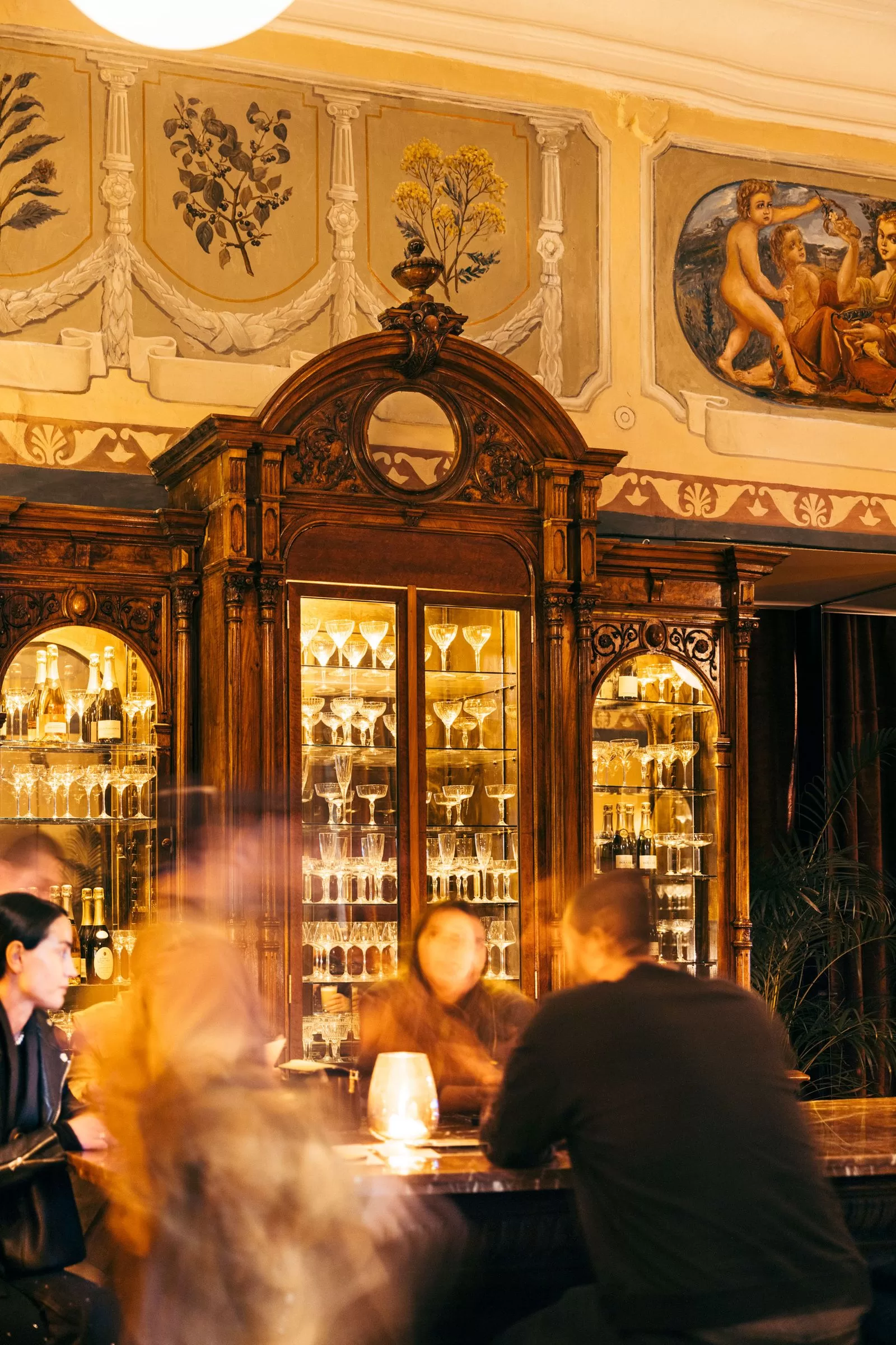 Image may contain Sir John Tenniel Gayatri Devi Pub Adult Person Accessories Bag Handbag Urban Cup and Furniture