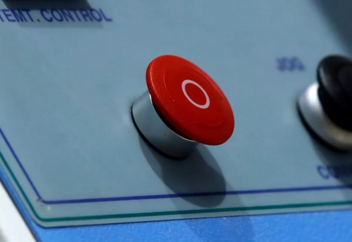 a photo of a red emergency stop button