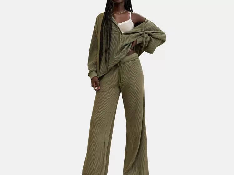 model in green waffle pants and shirt