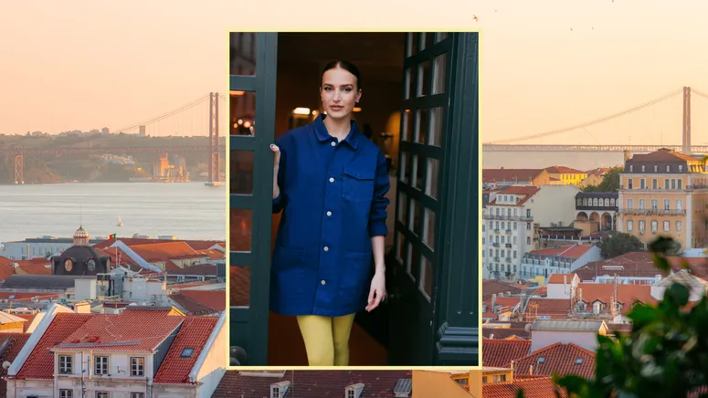 Image may contain: City, Person, Architecture, Building, Condo, Housing, Face, Head, Photography, Portrait, and Urban