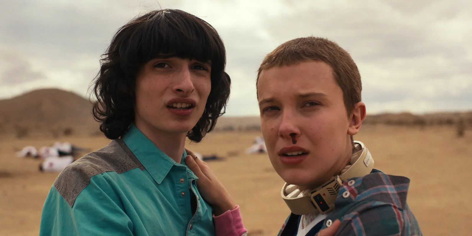 Image may contain Millie Bobby Brown Finn Wolfhard Face Head Person Photography Portrait Child Beach and Coast