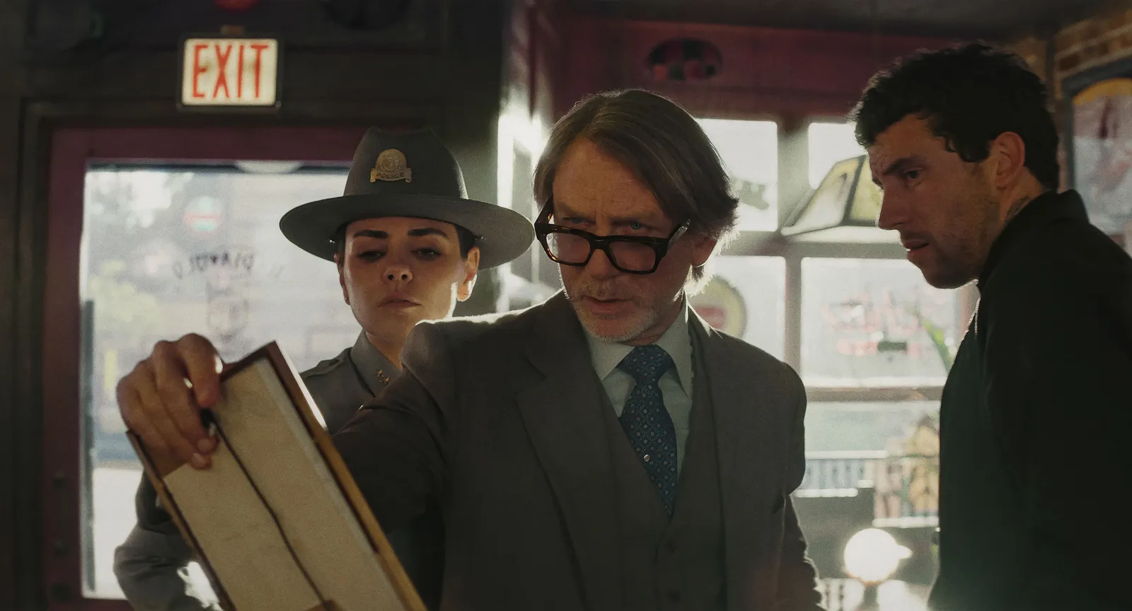 Image may contain Daniel Craig Mila Kunis Face Head Person Photography Portrait Clothing Formal Wear Suit and Coat