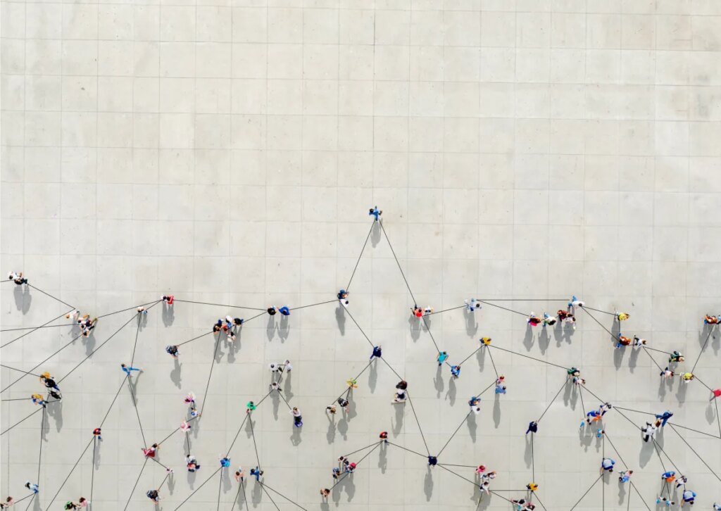 People connected by data points to show a graph.