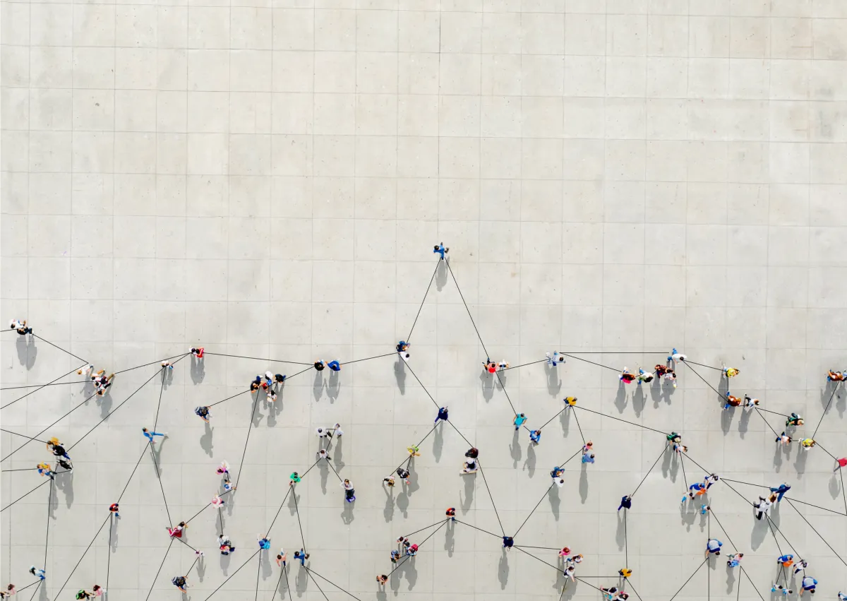 People connected by data points to show a graph.