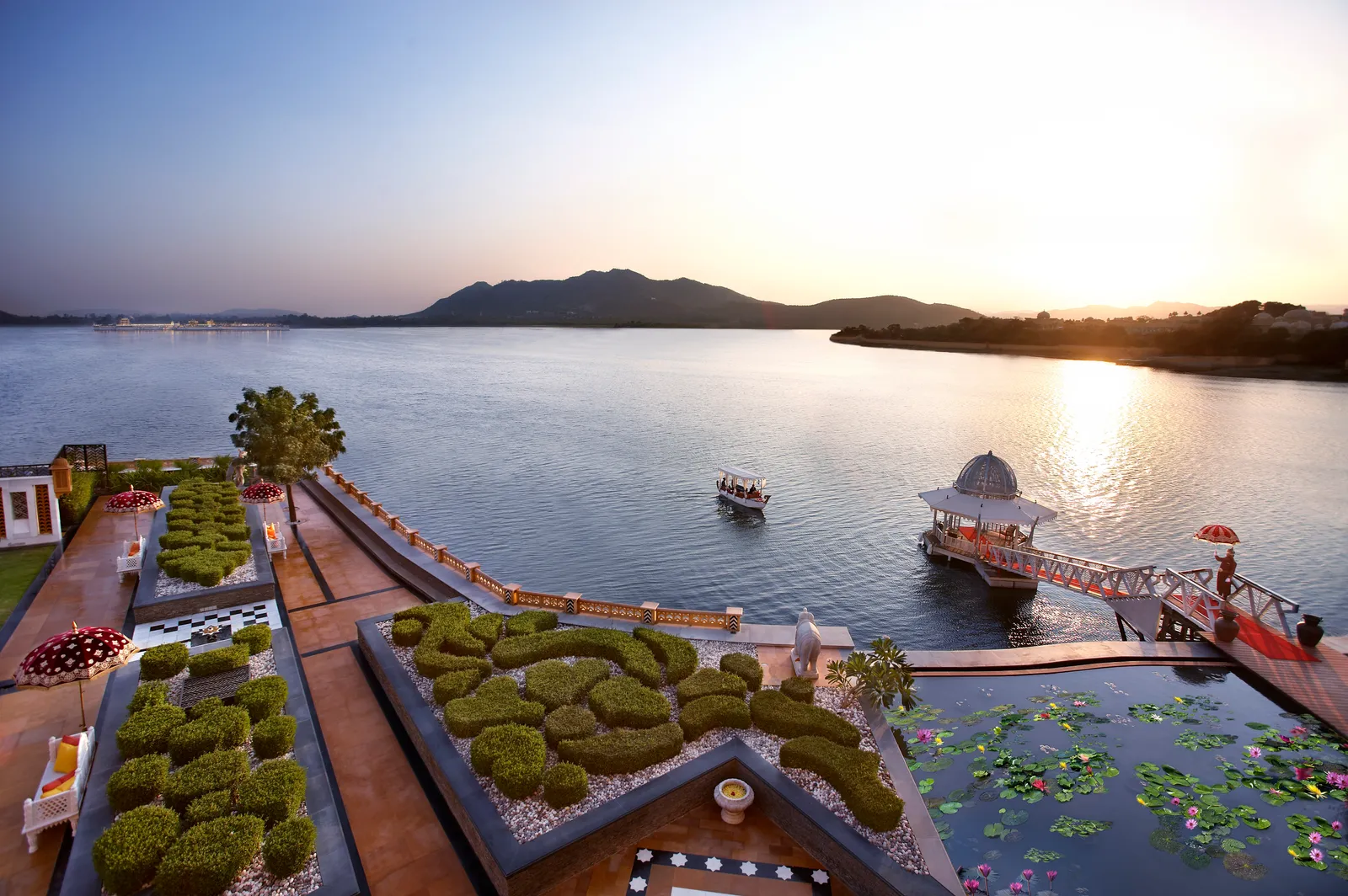 Image may contain Nature Outdoors Scenery Boat Transportation Vehicle Pool Swimming Pool Water and Lakefront