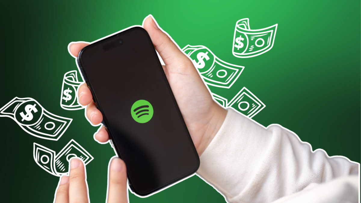 Spotify logo on mobile phone with cartoony dollar bills floating in background