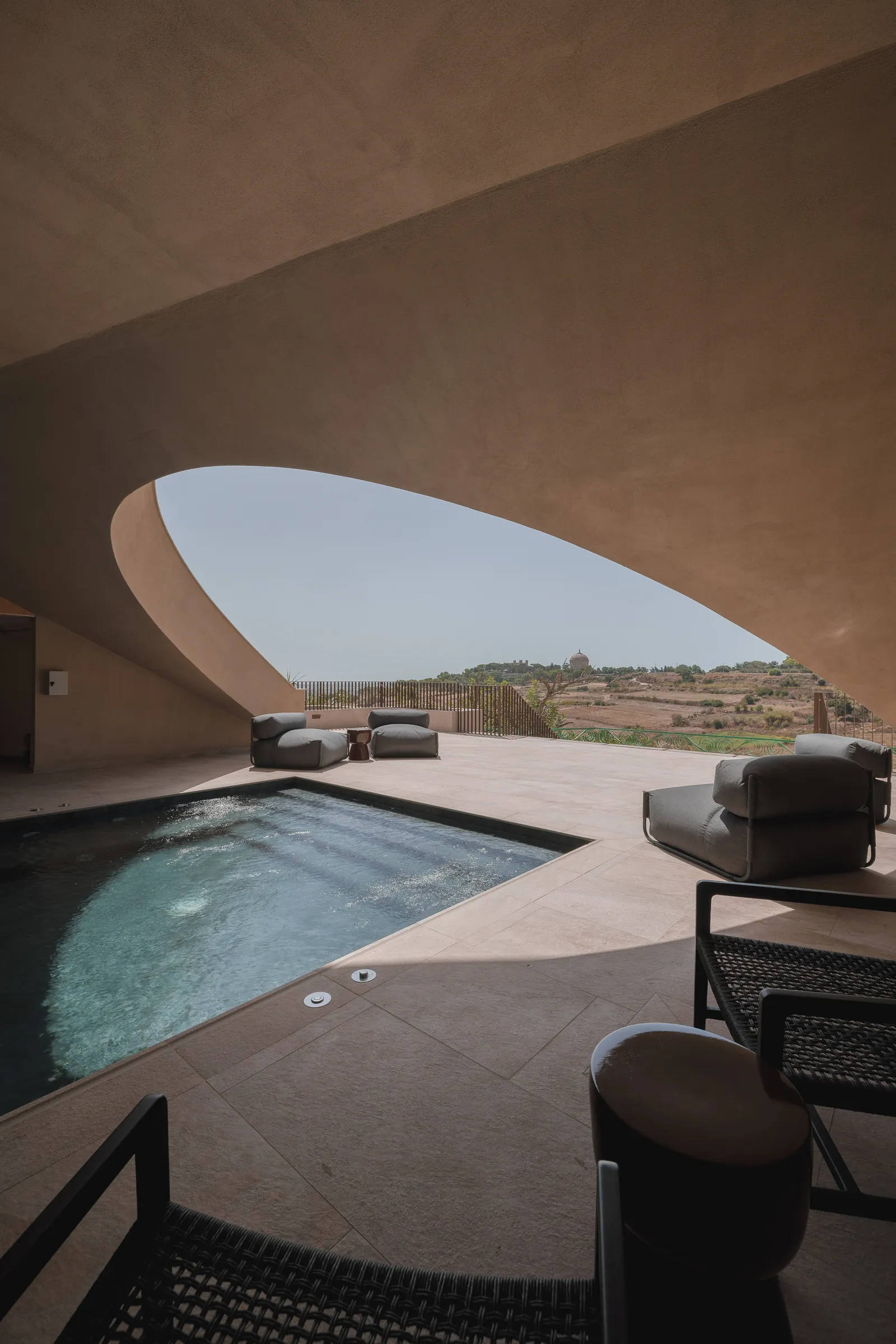 Image may contain Pool Water Swimming Pool Indoors Interior Design Chair Furniture Architecture Building and House