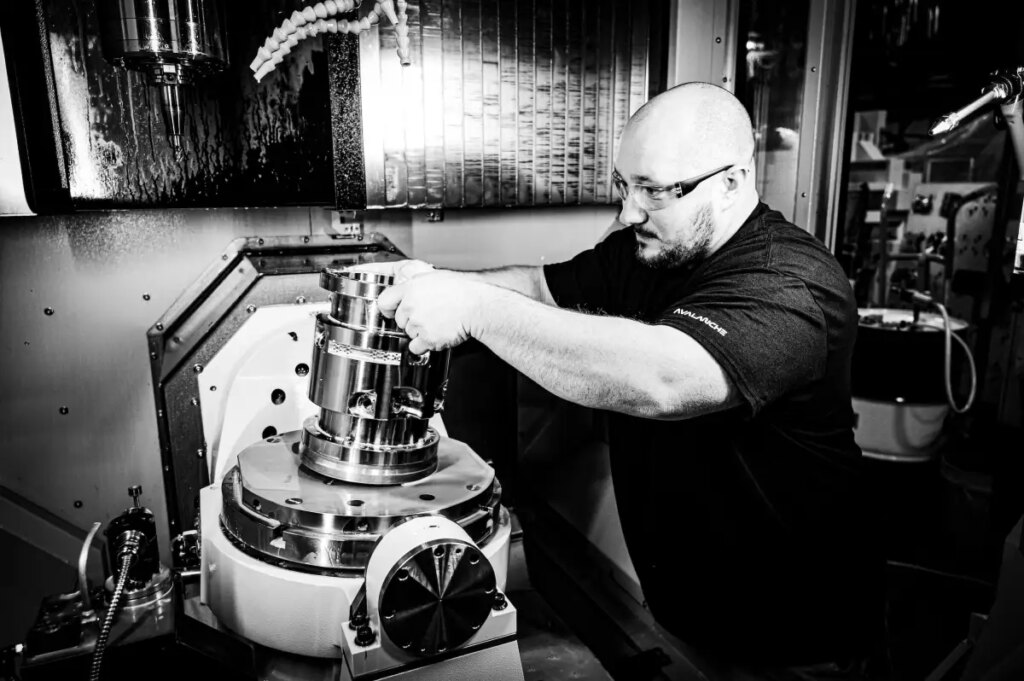 A man assembles a fusion device.