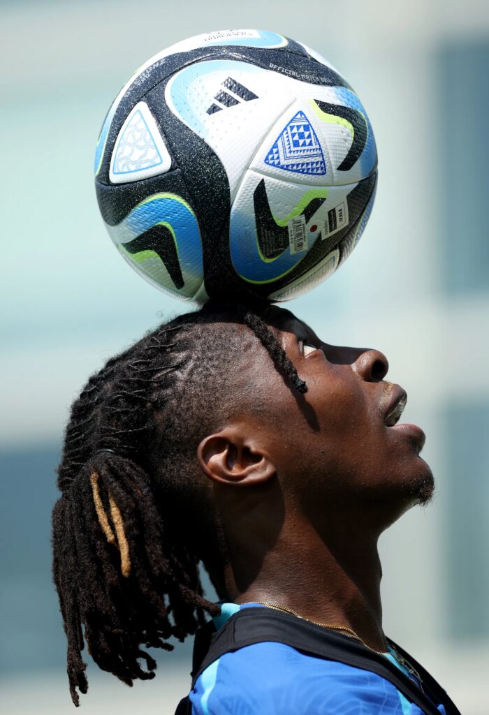 Image may contain Moryk Fofana Ball Football Soccer Soccer Ball Sport Person Playing Volleyball and Volleyball