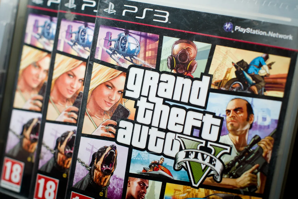 Close view of the packaging of the console game Grand Theft Auto 5.